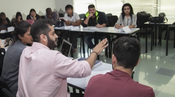 STUDENTS SIMULATE BOARDROOM BATTLE TO BRING BUSINESS LESSONS TO LIFE