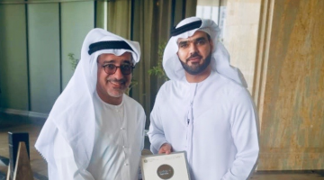 CUD Alumni Mohammed Sabt receiving award