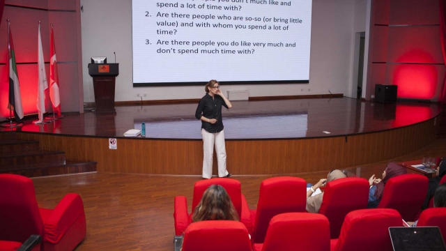 Dr. Louise addressing Faculty and Students on happiness.