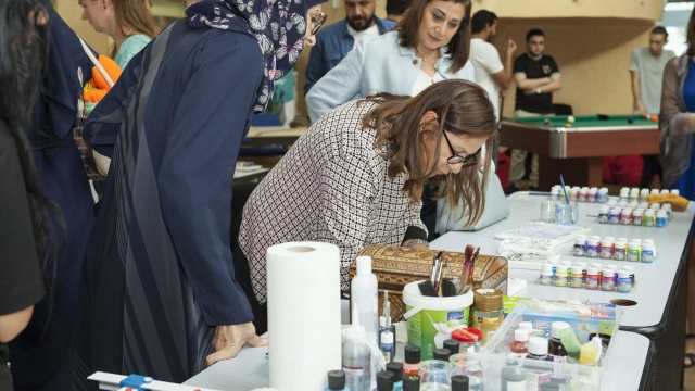 CANADIAN UNIVERSITY DUBAI HOLDS SCARF FASHION SHOW TO PROMOTE BREAST CANCER AWARENESS